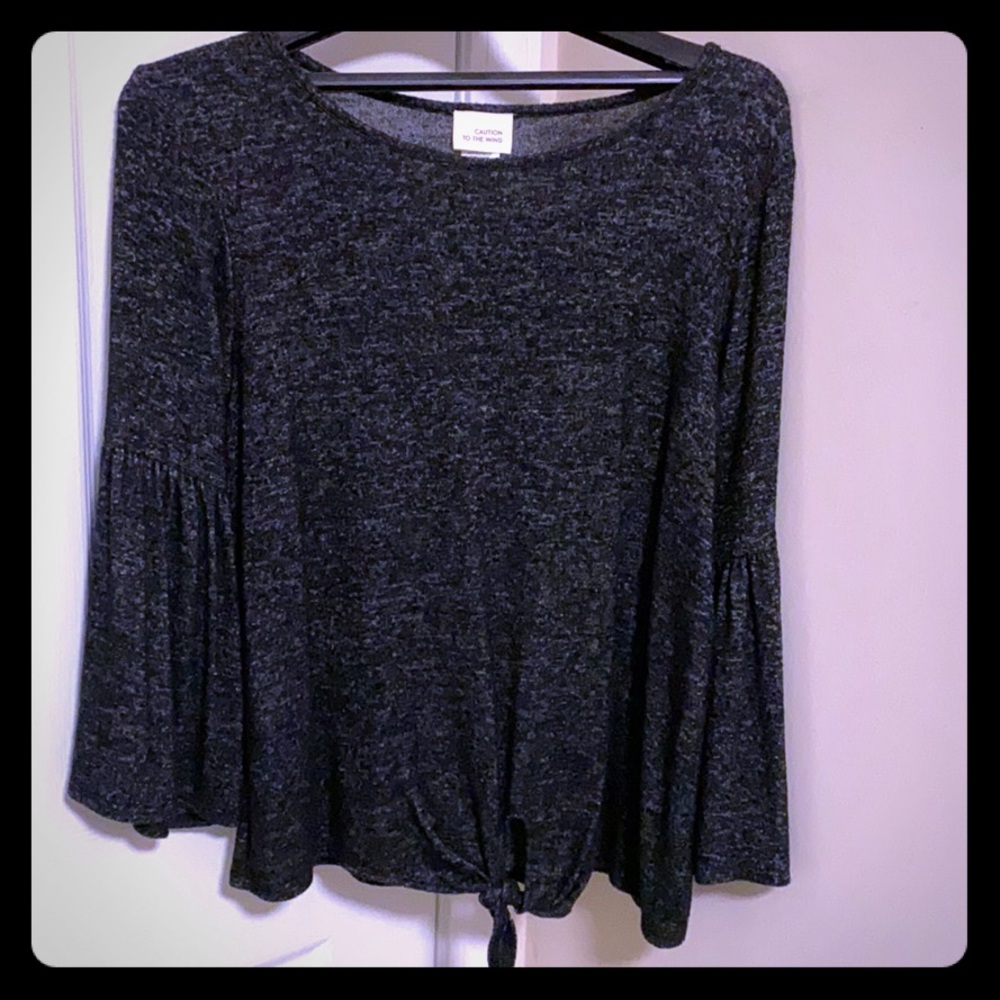 Super soft top. Caution to the Wind.